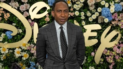 Stephen A. Smith told Michelle Obama that “you will never hear me utter a negative word about you.” (REUTERS)