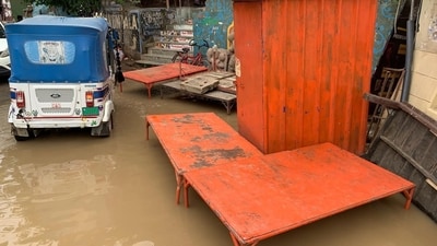 A seating arrangement along a ghat stands submerged, as floodwater fills Varanasi. (Rajesh Kumar/HT)
