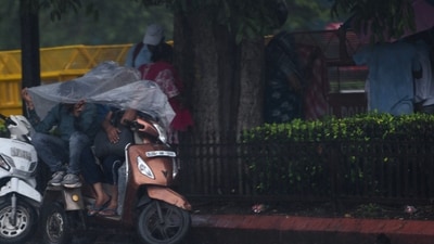 Heavy rainfall lashed several parts of Delhi on Sunday, offering much-needed relief from the humidity but also triggering widespread waterlogging (ANI) Heavy rainfall lashed several parts of Delhi on Sunday, offering much-needed relief from the humidity but also triggering widespread waterlogging (ANI)