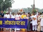 Congress MP Priyanka Gandhi, along with other INDIA bloc MPs protest against Special Intensive Revision (SIR) of electoral rolls in Bihar, in New Delhi on Thursday.