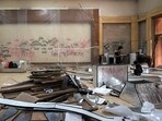 In this photograph, labourers work inside the former official residence of Bangladesh's ousted prime minister Sheikh Hasina in Dhaka. In this photograph, labourers work inside the former official residence of Bangladesh's ousted prime minister Sheikh Hasina in Dhaka.