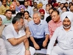 BJP state president Sunil Jakhar sitting on protest along with local party leaders at MC Zone D office in Ludhiana on Monday. (Gurpreet Singh/HT) BJP state president Sunil Jakhar sitting on protest along with local party leaders at MC Zone D office in Ludhiana on Monday. (Gurpreet Singh/HT)