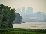 A smoky haze from wildfires, with a poor air quality rating, covers the skyline of Montreal, Quebec, Canada