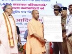 Chief minister Yogi Adityanath distributed appointment letters to 1,374 assistant operators and 120 workshop staff selected for the UP Police telecommunications department. (HT Photo) Chief minister Yogi Adityanath distributed appointment letters to 1,374 assistant operators and 120 workshop staff selected for the UP Police telecommunications department. (HT Photo)