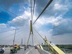 Overcast skies atop the Signature Bridge, as Delhi recorded 16.7mm rain overnight. (Sanchit Khanna/HT Photo) Overcast skies atop the Signature Bridge, as Delhi recorded 16.7mm rain overnight. (Sanchit Khanna/HT Photo)