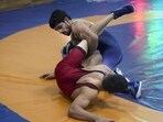 Paris Olympics bronze medallist Aman Sehrawat (in blue) competes during the World Wrestling Championships trials, in Lucknow. (PTI)