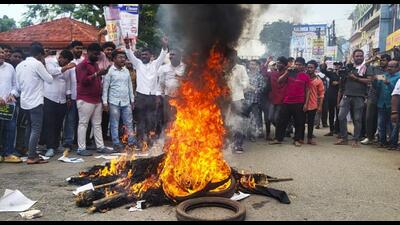 A protest over the self-immolation in Balasore. (PTI) A protest over the self-immolation in Balasore. (PTI)