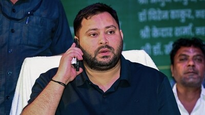 LoP in Bihar assembly and RJD leader Tejashwi Yadav attends Adhikaar Mahasammelan programme at S.K. Memorial hall, in Patna on Saturday. (ANI Photo) (Rahul Sharma) LoP in Bihar assembly and RJD leader Tejashwi Yadav attends Adhikaar Mahasammelan programme at S.K. Memorial hall, in Patna on Saturday. (ANI Photo) (Rahul Sharma)