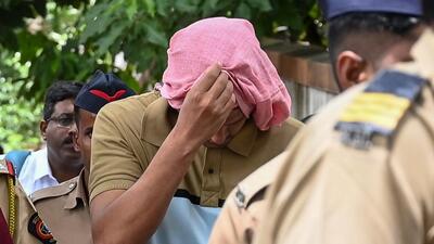 Clad in a t-shirt and trousers, the 35-year-old Chetan Singh Chaudhary presented a picture of docility as he was led into and out of the courtroom by policemen (Raju Shinde/ HT Photo) Clad in a t-shirt and trousers, the 35-year-old Chetan Singh Chaudhary presented a picture of docility as he was led into and out of the courtroom by policemen (Raju Shinde/ HT Photo)