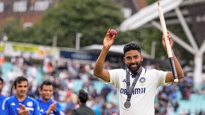 Mohammed Siraj poses after being named the 'player of the match' following India's win in the fifth Test match against England, at The Oval. (PTI) Mohammed Siraj poses after being named the 'player of the match' following India's win in the fifth Test match against England, at The Oval. (PTI)