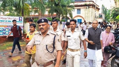 Police personnel investigate after a female student allegedly set herself on fire over sexual harassment at Fakir Mohan (Autonomous) College, in Balasore district, Odisha, Saturday, July 12, 2025. (PTI) Police personnel investigate after a female student allegedly set herself on fire over sexual harassment at Fakir Mohan (Autonomous) College, in Balasore district, Odisha, Saturday, July 12, 2025. (PTI)