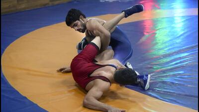 Paris Olympics bronze medallist Aman Sehrawat (in blue) competes during the World Wrestling Championships trials, in Lucknow. (PTI) Paris Olympics bronze medallist Aman Sehrawat (in blue) competes during the World Wrestling Championships trials, in Lucknow. (PTI)