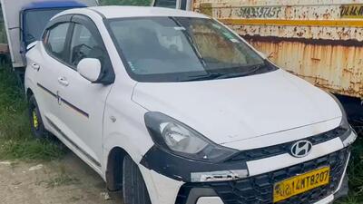 The car belonging to one of the victims in which both were found dead. (HT Photo) The car belonging to one of the victims in which both were found dead. (HT Photo)