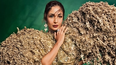 Outfit: Rahul Mishra | Jewellery: Raj Mahtani | Handcrafted to resemble a blooming forest, the ensemble creates a surreal, botanical drama, combining boldness with nature-inspired elegance from Rahul Mishra. The jewellery by Raj Mahtani, pearl drop earrings along with chunky rings, is bold and eye-catching, perfect to add a touch of glam. (Photographer: Abheet Gidwani) Outfit: Rahul Mishra | Jewellery: Raj Mahtani | Handcrafted to resemble a blooming forest, the ensemble creates a surreal, botanical drama, combining boldness with nature-inspired elegance from Rahul Mishra. The jewellery by Raj Mahtani, pearl drop earrings along with chunky rings, is bold and eye-catching, perfect to add a touch of glam. (Photographer: Abheet Gidwani)