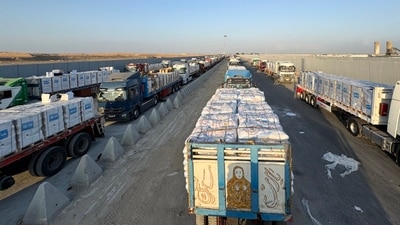 Trucks loaded with humanitarian aid at the Rafah crossing with the Gaza Strip, Aug. 3. Trucks loaded with humanitarian aid at the Rafah crossing with the Gaza Strip, Aug. 3.