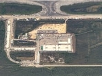 An aerial view of a migrant detention center, dubbed "Alligator Alcatraz," is seen located at the site of the Dade-Collier Training and Transition Airport i An aerial view of a migrant detention center, dubbed "Alligator Alcatraz," is seen located at the site of the Dade-Collier Training and Transition Airport i