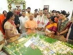 Chief minister Yogi Adityanath having a look at the model of the township in Agra. (Sourced) Chief minister Yogi Adityanath having a look at the model of the township in Agra. (Sourced)