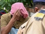 Clad in a t-shirt and trousers, the 35-year-old Chetan Singh Chaudhary presented a picture of docility as he was led into and out of the courtroom by policemen (Raju Shinde/ HT Photo)