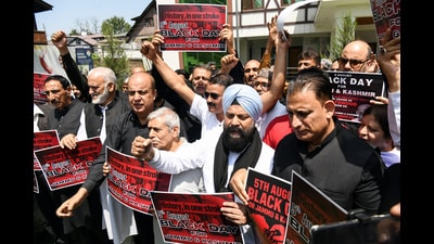 Congress leaders and workers stage during a protest on Tuesday. (PTI) Congress leaders and workers stage during a protest on Tuesday. (PTI)