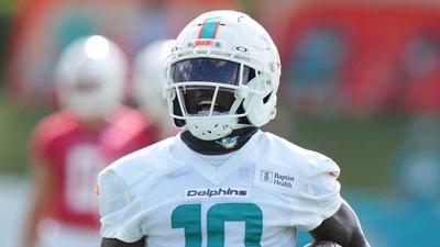 Miami Dolphins wide receiver Tyreek Hill (10) runs with the football during practice at the NFL football team's training camp, Saturday, July 26, 2025, in Miami Gardens, Fla. (AP Photo/Lynne Sladky) (AP) Miami Dolphins wide receiver Tyreek Hill (10) runs with the football during practice at the NFL football team's training camp, Saturday, July 26, 2025, in Miami Gardens, Fla. (AP Photo/Lynne Sladky) (AP)
