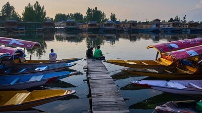 A group of Kashmiri men fish on Dal Lake in Srinagar. (AP file) A group of Kashmiri men fish on Dal Lake in Srinagar. (AP file)