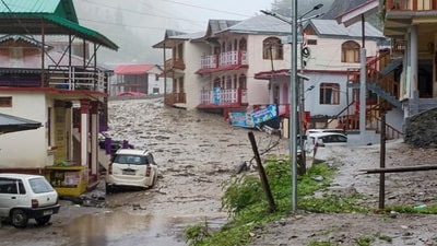 A flash flood gushes through Dharali village in Uttarkashi district, Uttarakhand, on Tuesday, August 5. (PTI) A flash flood gushes through Dharali village in Uttarkashi district, Uttarakhand, on Tuesday, August 5. (PTI)