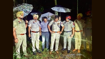 Police officials at the spot where accused Saleem was shot after he tried to snatch a cop’s service gun during a weapon recovery operation in Machhiwara on Tuesday. (HT Photo) Police officials at the spot where accused Saleem was shot after he tried to snatch a cop’s service gun during a weapon recovery operation in Machhiwara on Tuesday. (HT Photo)