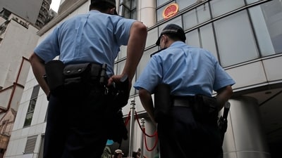 Police said two teenage girls were being sent to a correctional school for assaulting and verbally abusing a 14-year-old girl surnamed Lai. (AP) Police said two teenage girls were being sent to a correctional school for assaulting and verbally abusing a 14-year-old girl surnamed Lai. (AP)