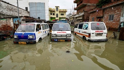 Visuals from flood-affected areas showed vehicles partially submerged in floodwaters in Uttar Pradesh. (Niharika Kulkarni / AFP) Visuals from flood-affected areas showed vehicles partially submerged in floodwaters in Uttar Pradesh. (Niharika Kulkarni / AFP)