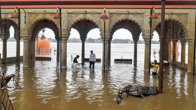 Baradari Ghat in Prayagraj was seen partially submerged after the water level of the River Yamuna rose on Sunday. (PTI)