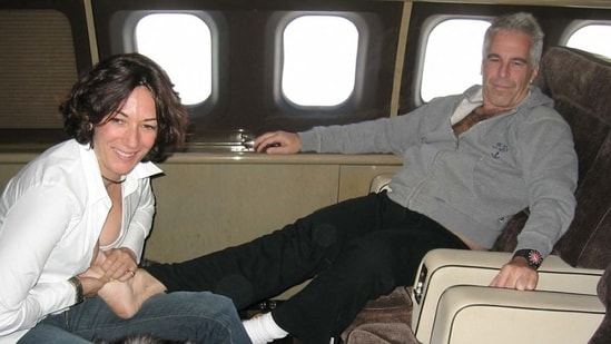 This undated trial evidence image shows British socialite Ghislaine Maxwell and US financier Jeffrey Epstein. (AFP)