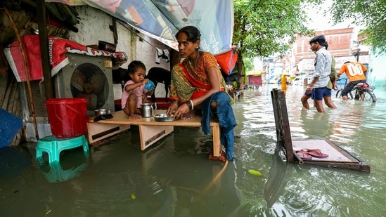 The water level of Ganga in Varanasi surpassed the danger mark of 71.26 on Sunday, submerging all 84 ghats and flooding more than 24 localities.&nbsp;(Niharika Kulkarni / AFP)