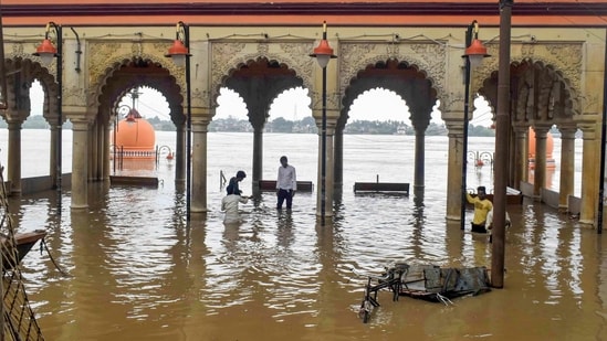 Baradari Ghat in Prayagraj was seen partially submerged after the water level of the River Yamuna rose on Sunday.(PTI)