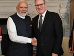 Jonathan Reynolds, UK business and trade secretary and Narendra Modi, India's prime minister. (Bloomberg)