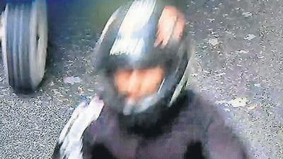 A CCTV grab of the alleged snatcher. (HT Photo) A CCTV grab of the alleged snatcher. (HT Photo)
