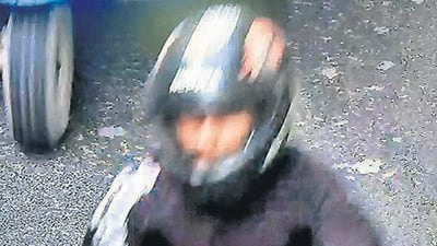 A CCTV grab of the alleged snatcher. (HT Photo) A CCTV grab of the alleged snatcher. (HT Photo)