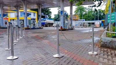 A milkman in Indore used a milk can lid as a helmet to get petrol. The stunt went viral, but officials shut the pump for ignoring the helmet rule enforcement. (Representative image) (ANI Grab ) A milkman in Indore used a milk can lid as a helmet to get petrol. The stunt went viral, but officials shut the pump for ignoring the helmet rule enforcement. (Representative image) (ANI Grab )