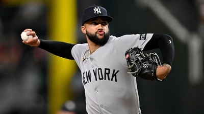 New York Yankees relief pitcher Devin Williams (38) pitches against the Texas Rangers during the ninth inning at Globe Life Field. Mandatory Credit: Jerome Miron-Imagn Images (IMAGN IMAGES via Reuters Connect)