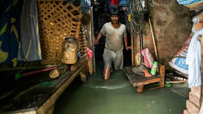 A local residents of Varanasi said drain water had entered their area, raising concerns about diseases like dengue. (AFP) A local residents of Varanasi said drain water had entered their area, raising concerns about diseases like dengue. (AFP)