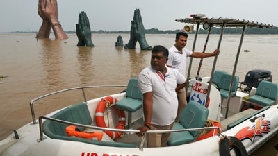 On Sunday alone, over 17,000 food packets were handed out to those hit by the flood. (AFP) On Sunday alone, over 17,000 food packets were handed out to those hit by the flood. (AFP)