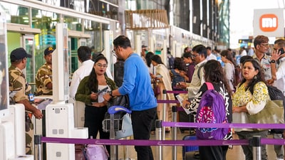 Passengers in queue at the Kempegowda International Airport in Bengaluru. (PTI) Passengers in queue at the Kempegowda International Airport in Bengaluru. (PTI)