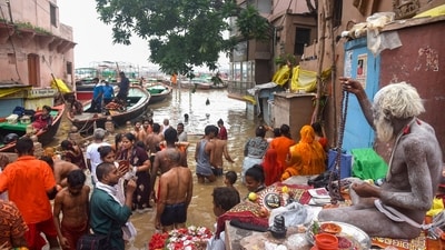 The river crossed the danger mark of 71.26 on Sunday, flooding all 84 ghats, over 24 neighbourhoods, and more than 32 villages in the district. (PTI) The river crossed the danger mark of 71.26 on Sunday, flooding all 84 ghats, over 24 neighbourhoods, and more than 32 villages in the district. (PTI)