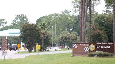 Traffic enters Fort Stewart at the main entrance gate following an active shooter incident on the U.S. Army base located in Hinesville (via REUTERS)