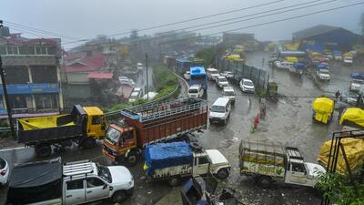 Shimla has been receiving heavy rain since Tuesday. The Chandigarh-Shimla national highway (NH-5) was blocked for four hours after a landslide at Chakki Mod in Solan district after heavy rain in the region around 8am on Wednesday. (PTI Photo) Shimla has been receiving heavy rain since Tuesday. The Chandigarh-Shimla national highway (NH-5) was blocked for four hours after a landslide at Chakki Mod in Solan district after heavy rain in the region around 8am on Wednesday. (PTI Photo)
