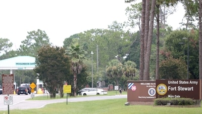 Traffic enters Fort Stewart at the main entrance gate following an active shooter incident on the U.S. Army base located in Hinesville, Georgia, U.S. August 6, 2025. (via REUTERS)