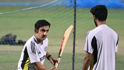 Gautam Gambhir, left, with Washington Sundar (AFP) Gautam Gambhir, left, with Washington Sundar (AFP)