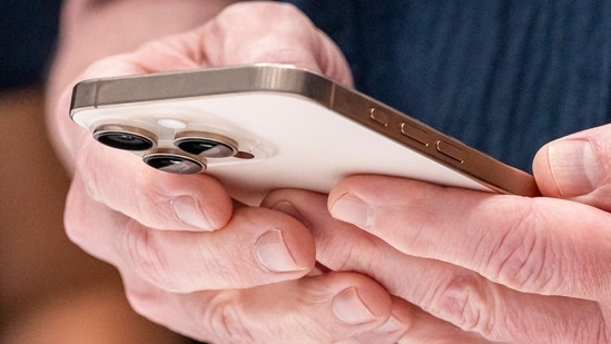 iPhone users must update their devices as soon as possible. (Bloomberg)