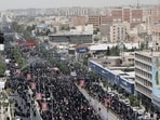 People attend the funeral procession of Iranian military commanders, nuclear scientists and others killed in Israeli strikes, in Tehran, Iran, June 28