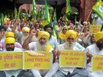 farmer unions and opposition parties have been protesting against land pooling policy. (HT File) farmer unions and opposition parties have been protesting against land pooling policy. (HT File)