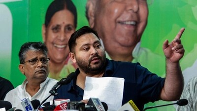 RJD leader Tejashwi Yadav on Thursday launched a scathing attack on Prime Minister Narendra Modi after Trump announced an additional 25 percent tariff on India (ANI) RJD leader Tejashwi Yadav on Thursday launched a scathing attack on Prime Minister Narendra Modi after Trump announced an additional 25 percent tariff on India (ANI)
